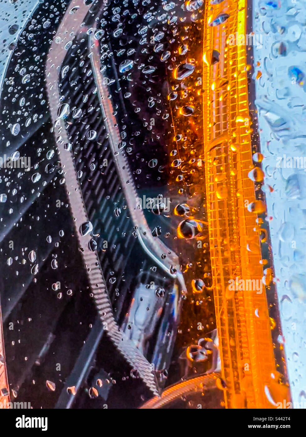 Closeup of BMW headlights with orange indicator Stock Photo Alamy