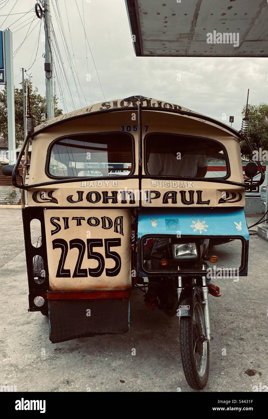 Filipino tricycle by Alejandra Parrado. Stock Photo