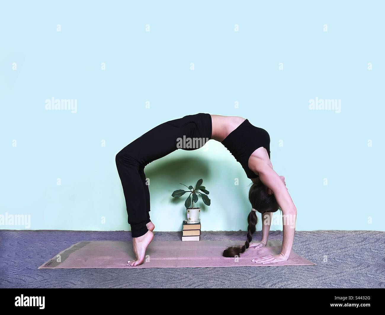 Yoga at home - Smartphone Captured Stock Image