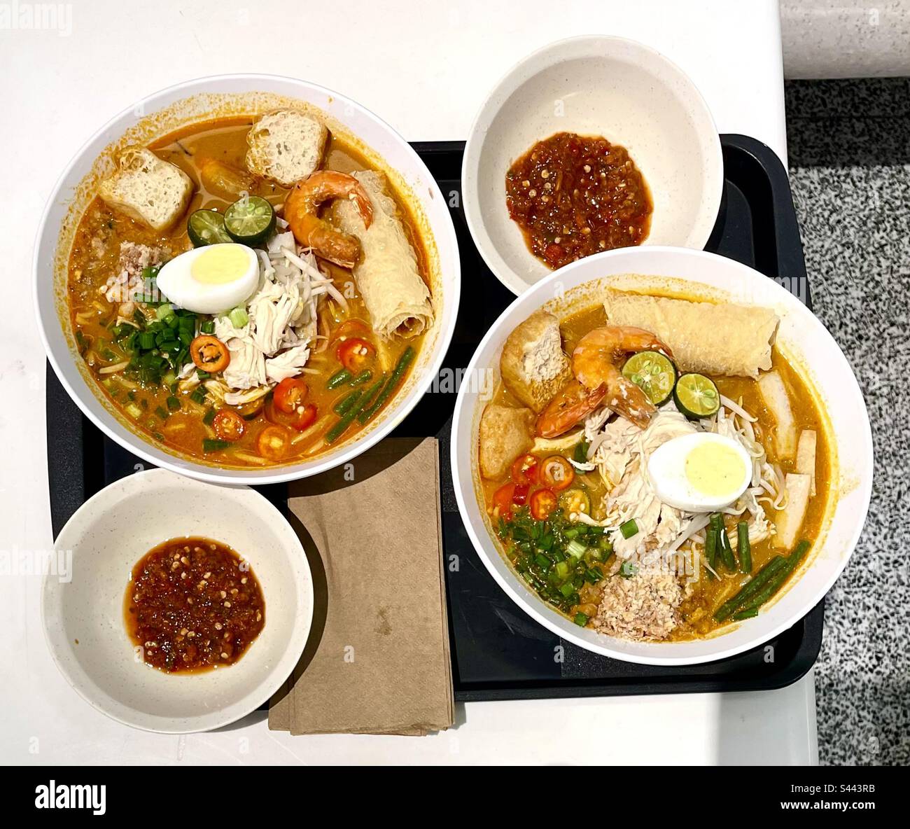 Two bowls of laksa noodle soup Stock Photo Alamy
