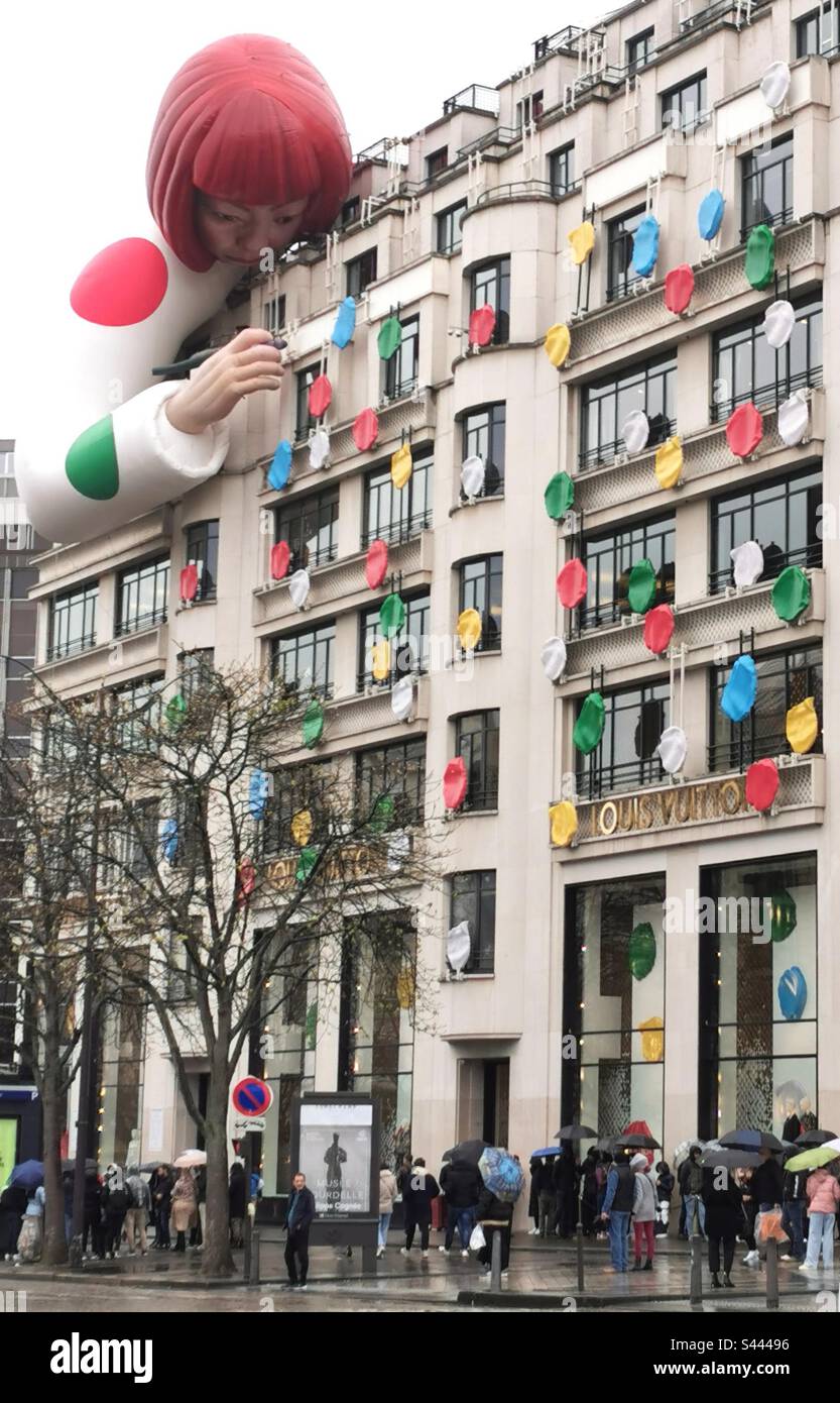 Installation of Yayoi Kusama's mannequin covers the exterior of the Louis  Vuitton's store in Paris