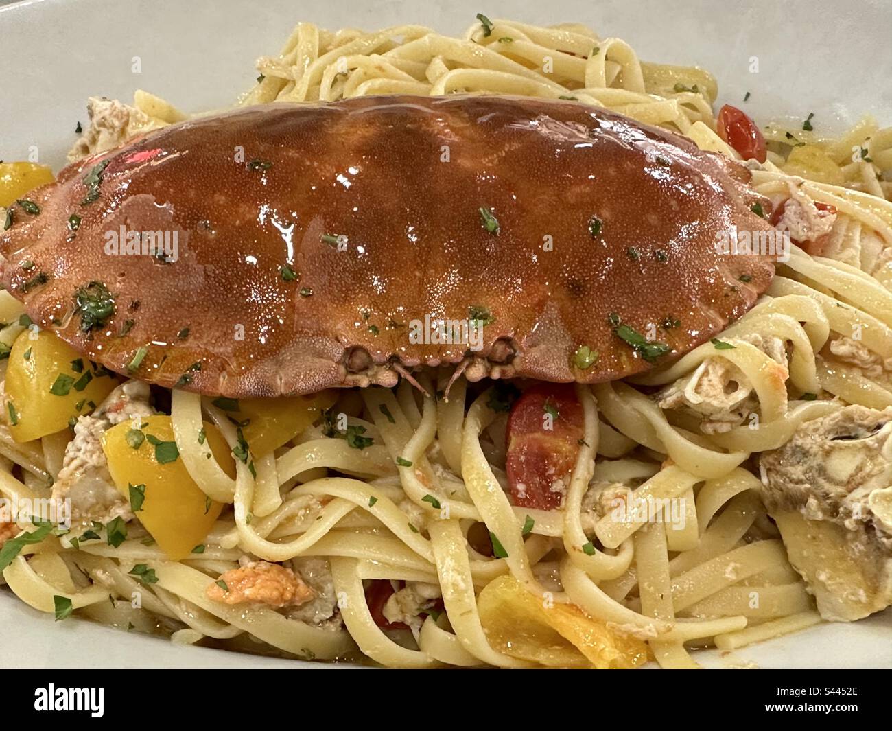 Noodles with spinous spider crab Stock Photo