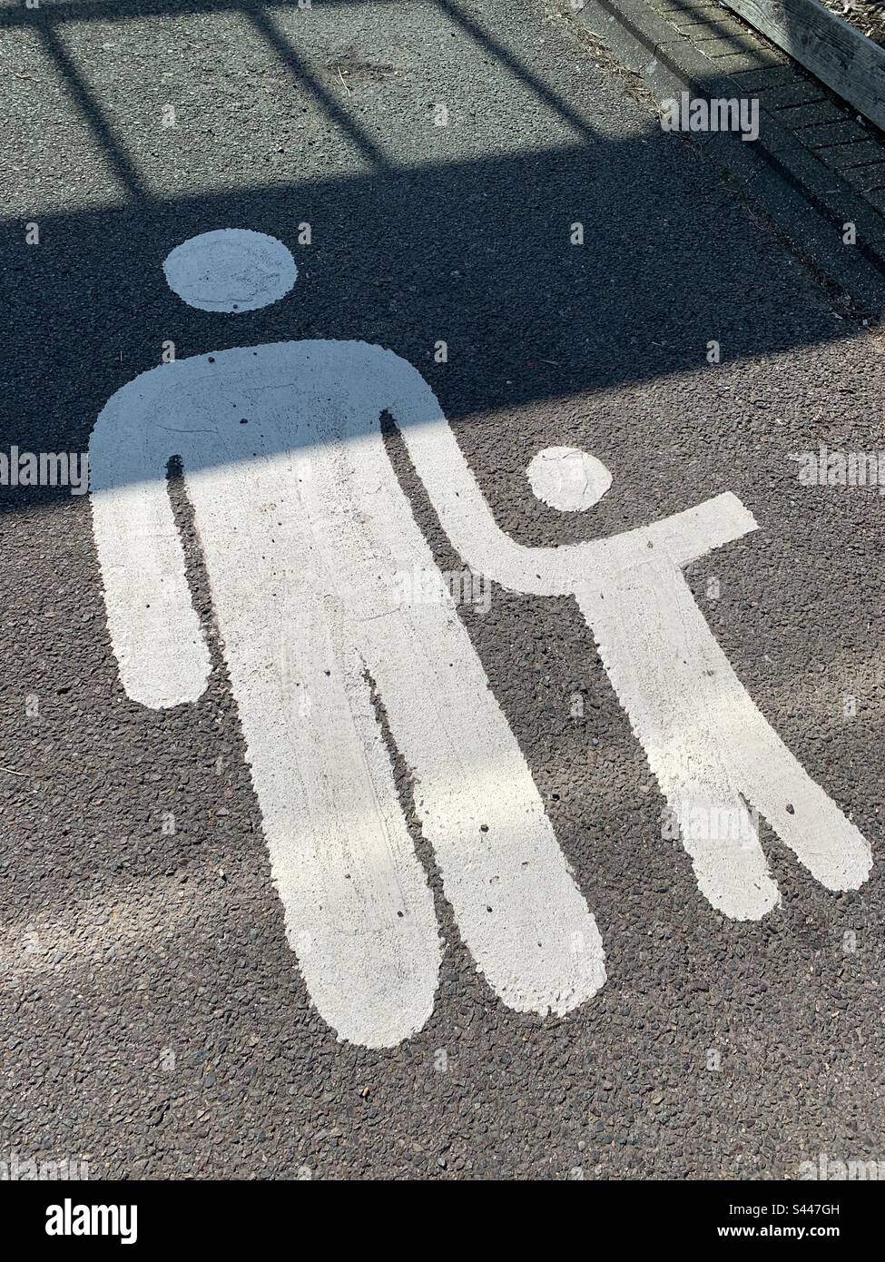 Parent and child parking bay paint markings. England, U.K Stock Photo Alamy