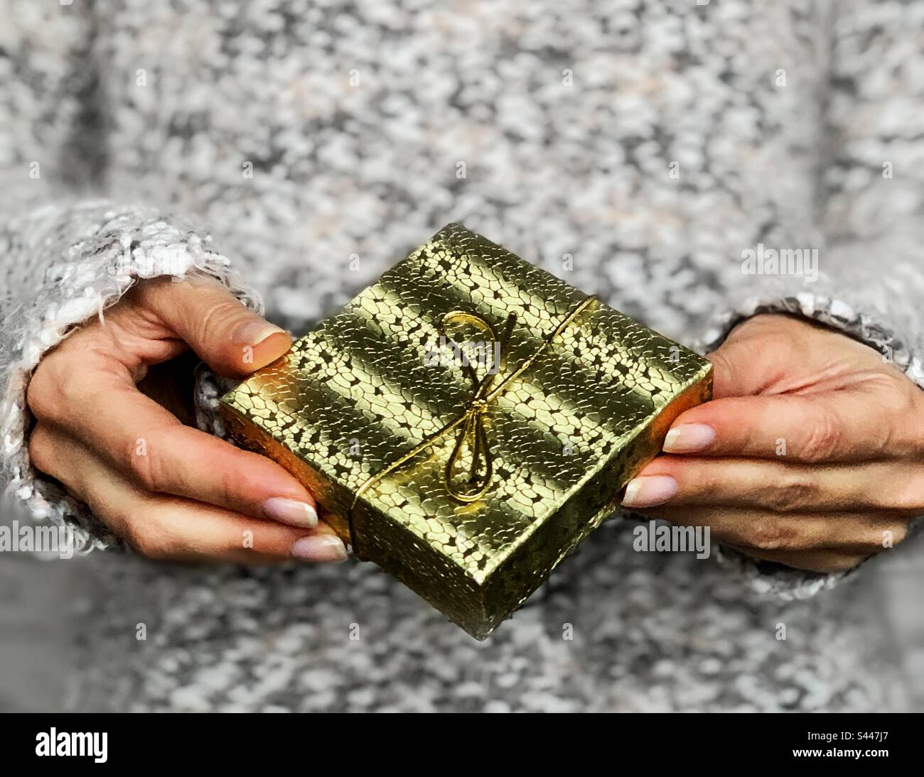 Golden gift box Stock Photo
