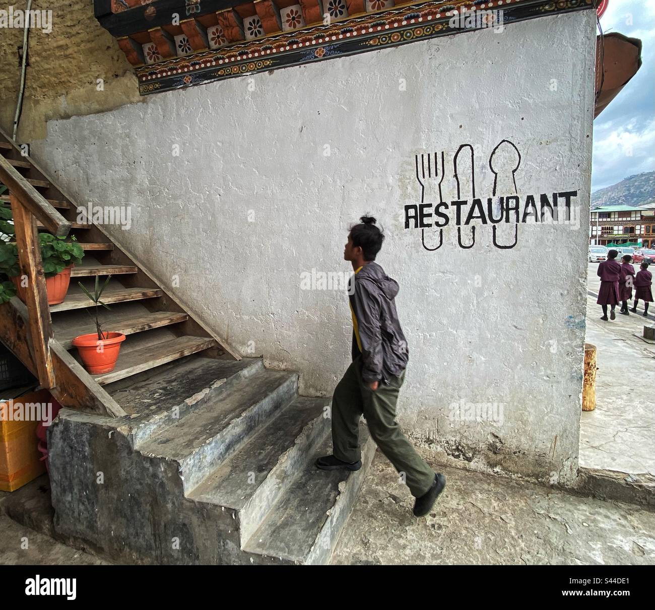 Walking up into a restaurant. Paro, Bhutan. - Smartphone Captured Stock Image
