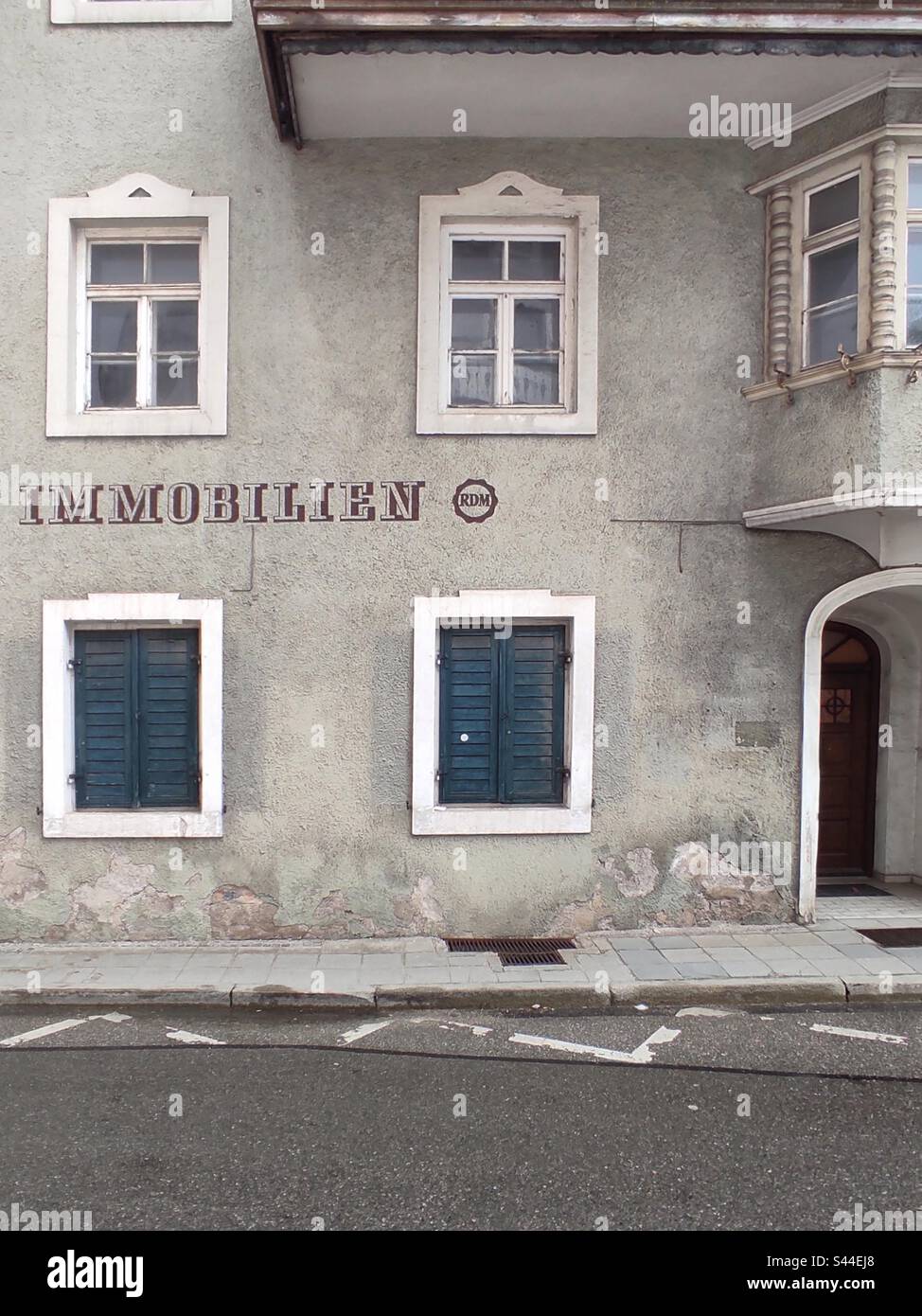 Old house in Germany with the painted word Immobilien advertising on the facade Stock Photo