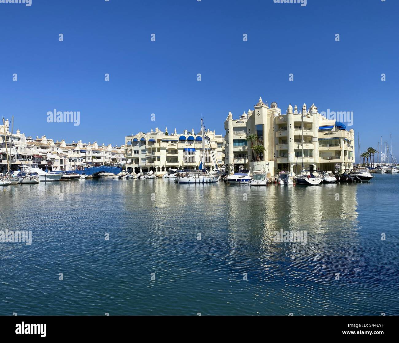 Benalmadena marina with waterfront apartments Stock Photo Alamy