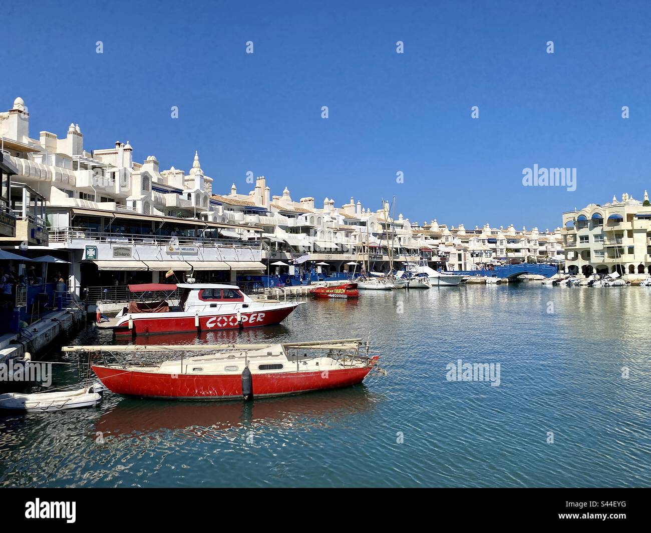 Benalmadena marina with boats and waterfront apartments Stock Photo Alamy