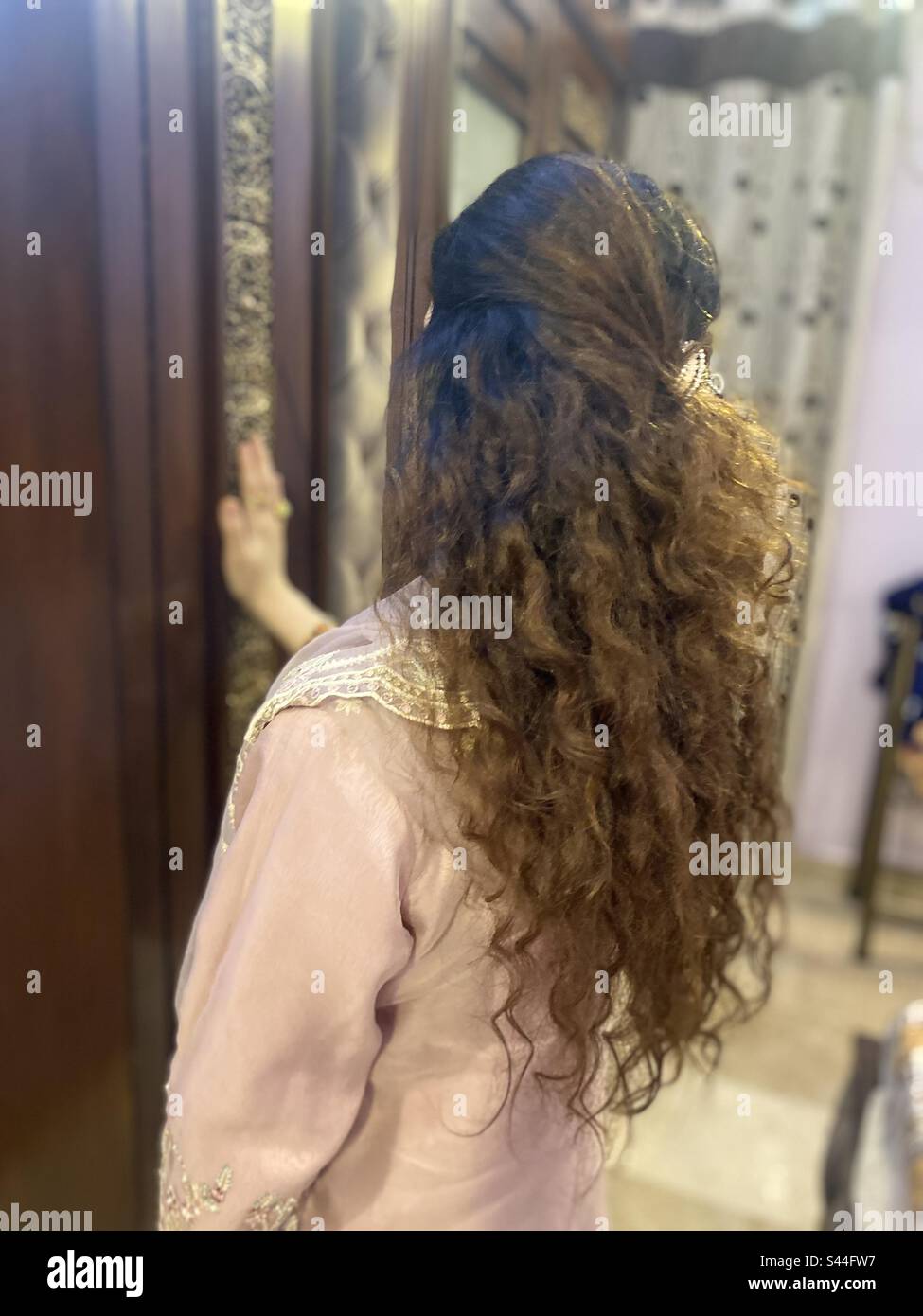 Curly hairs hi-res stock photography and images - Alamy