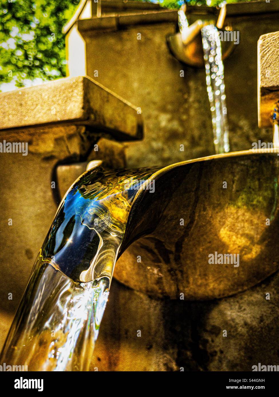 Water fountain at the National botanical gardens in Carmarthenshire, Wales, UK. - Smartphone Captured Stock Image