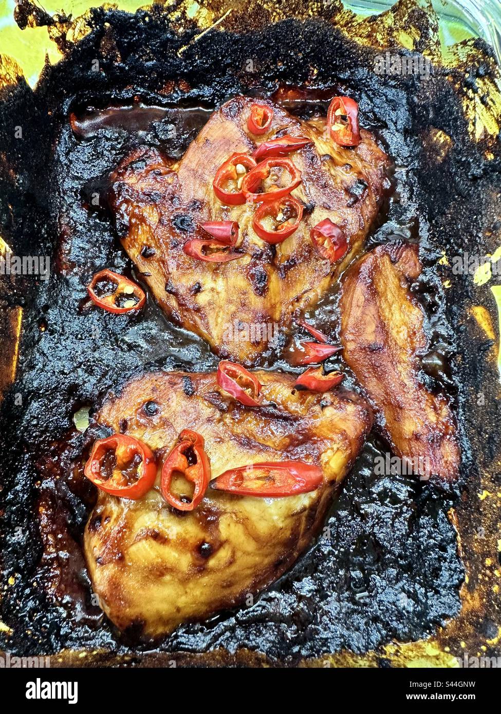 Burnt Korean BBQ chicken Stock Photo