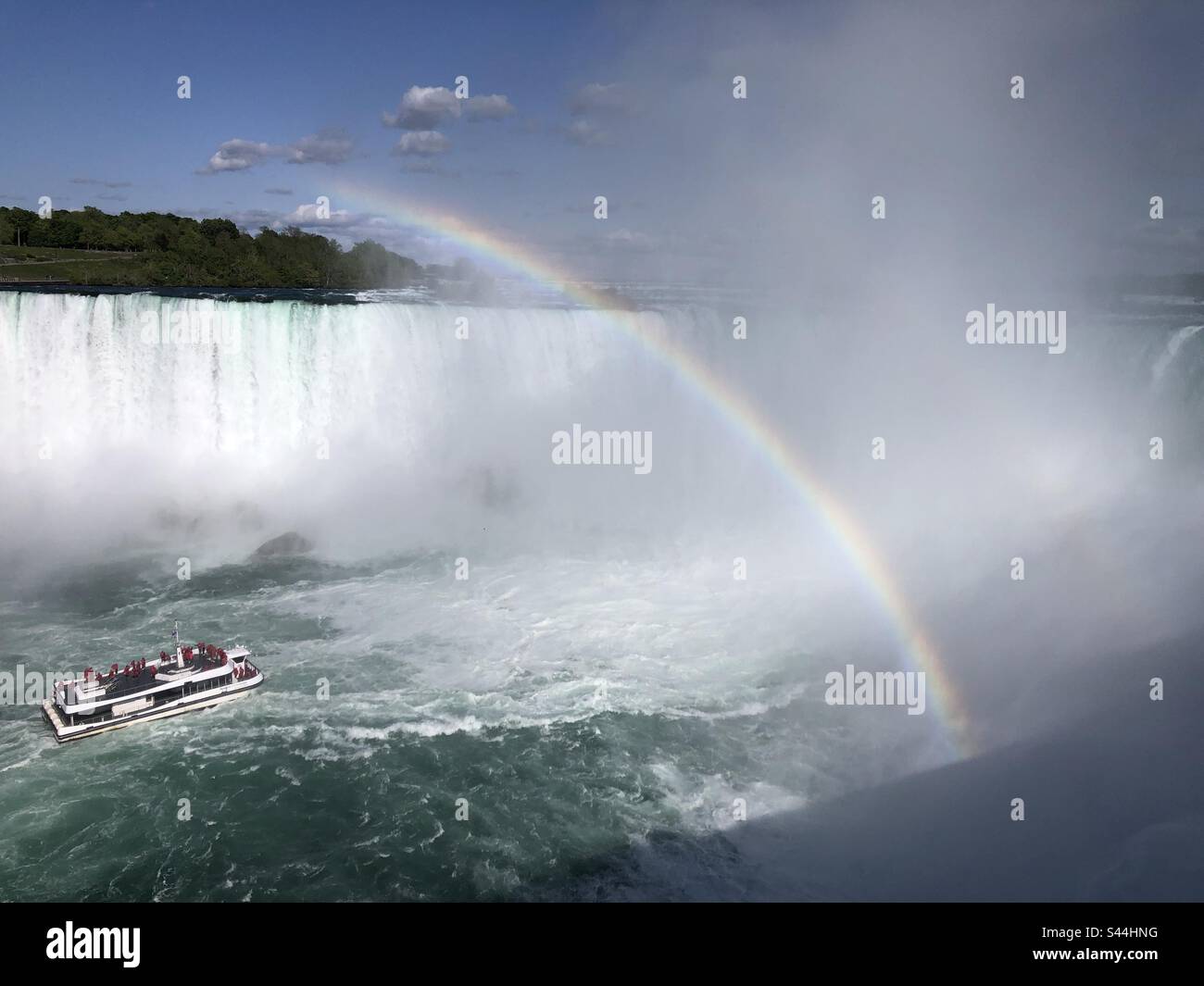 Rainbow appears over the Horseshoe Falls, Ontario, Canada. - Smartphone Captured Stock Image