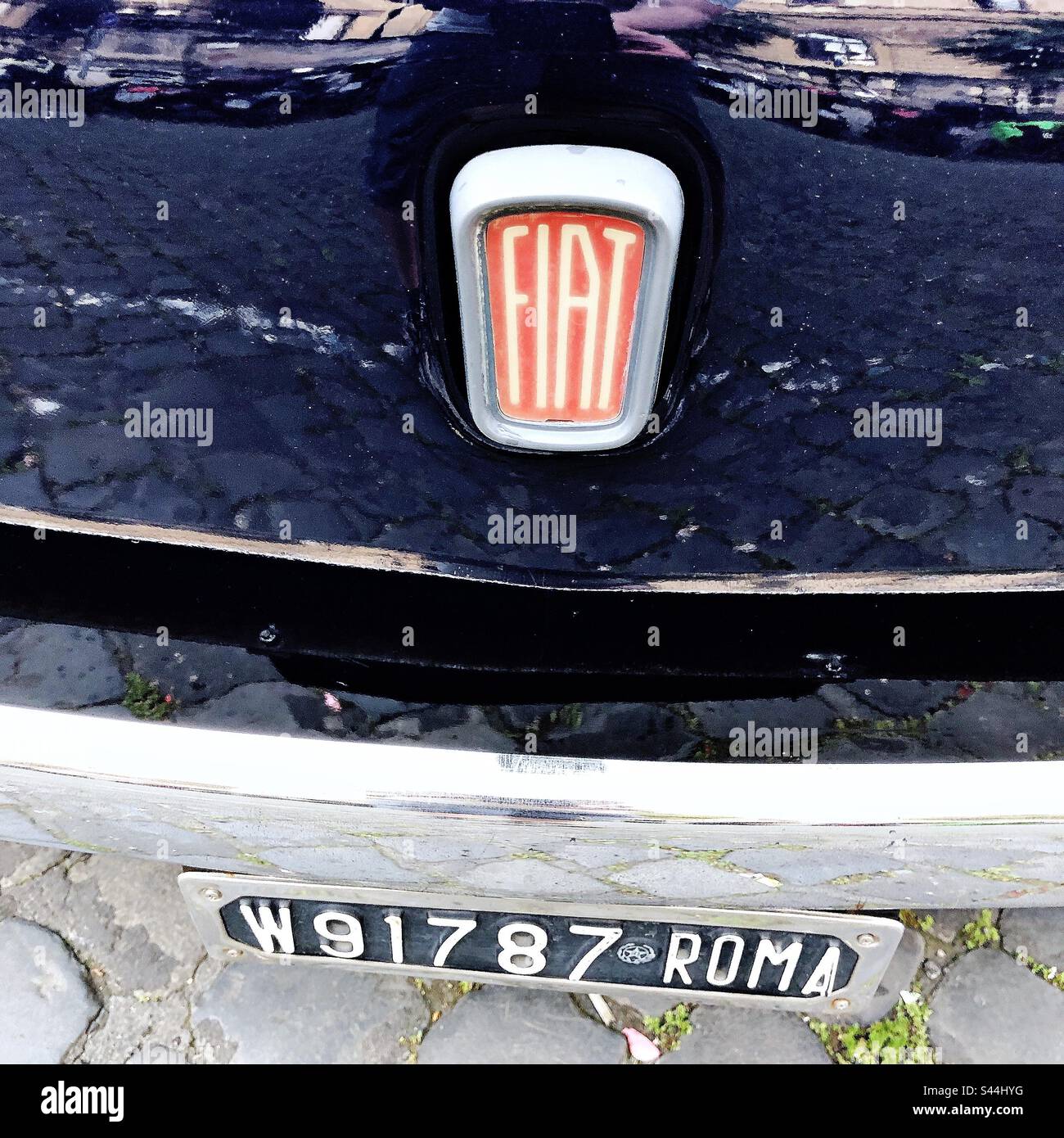 Reflections on a Fiat car in Rome, Italy Stock Photo Alamy