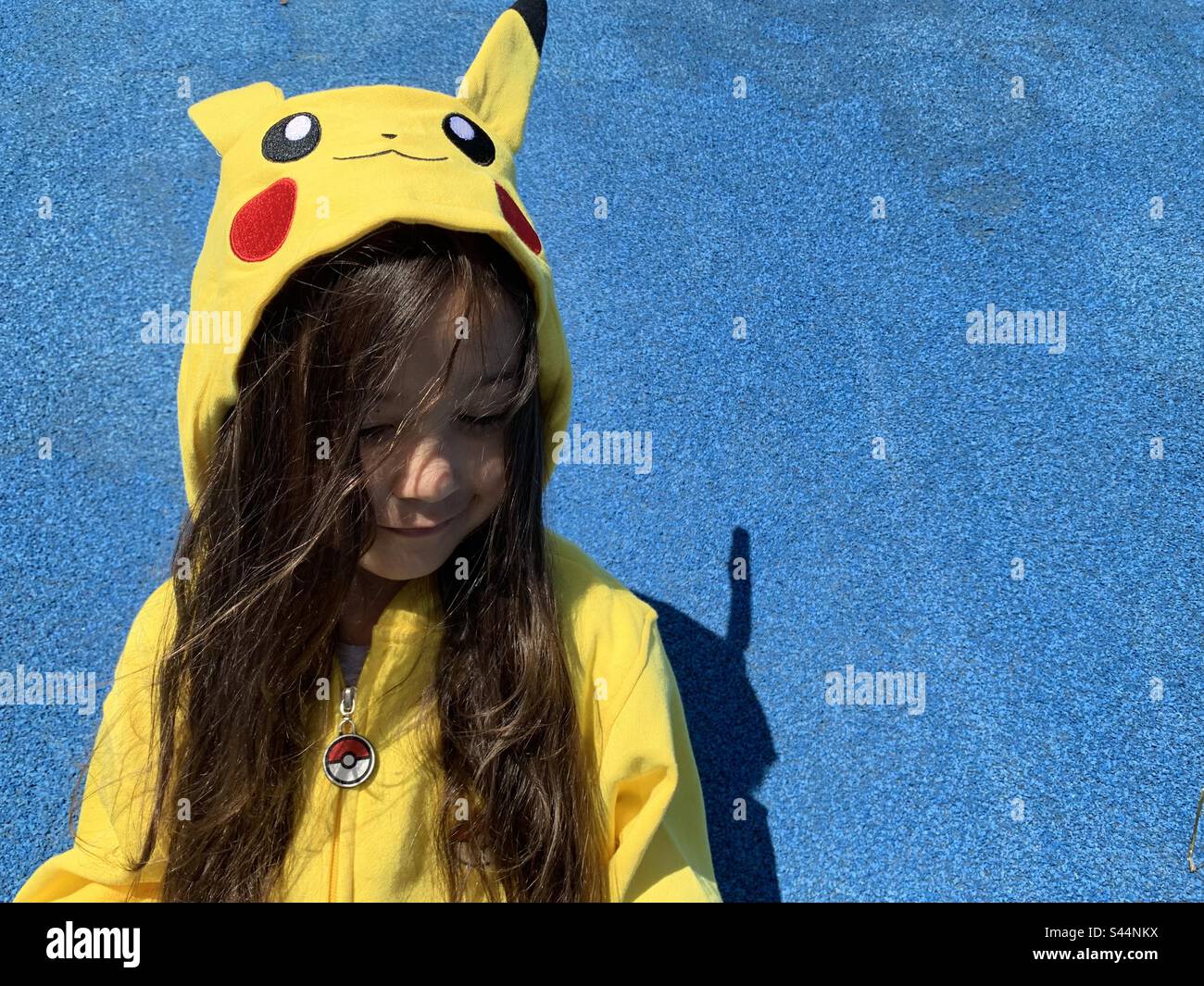 Woman sitting in a car and playing a Pokemon Go game Stock Photo - Alamy