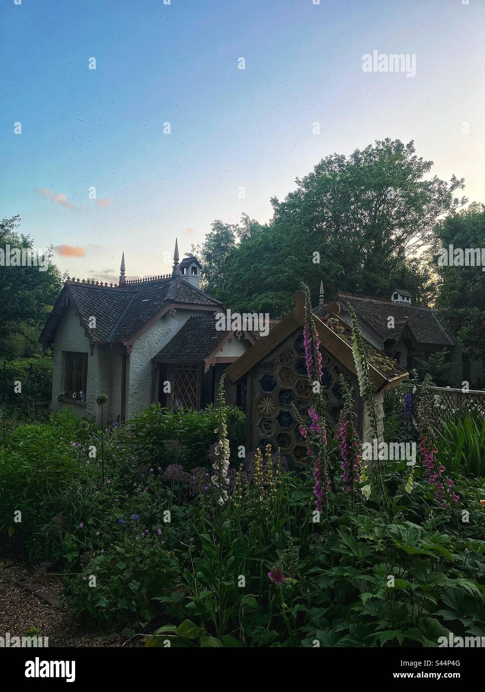 Duck Island Cottage, the picturesque lodge which serves as the offices of the London Historic Parks and Gardens Trust in St James's Park has a long history going back centuries. - Smartphone Captured Stock Image