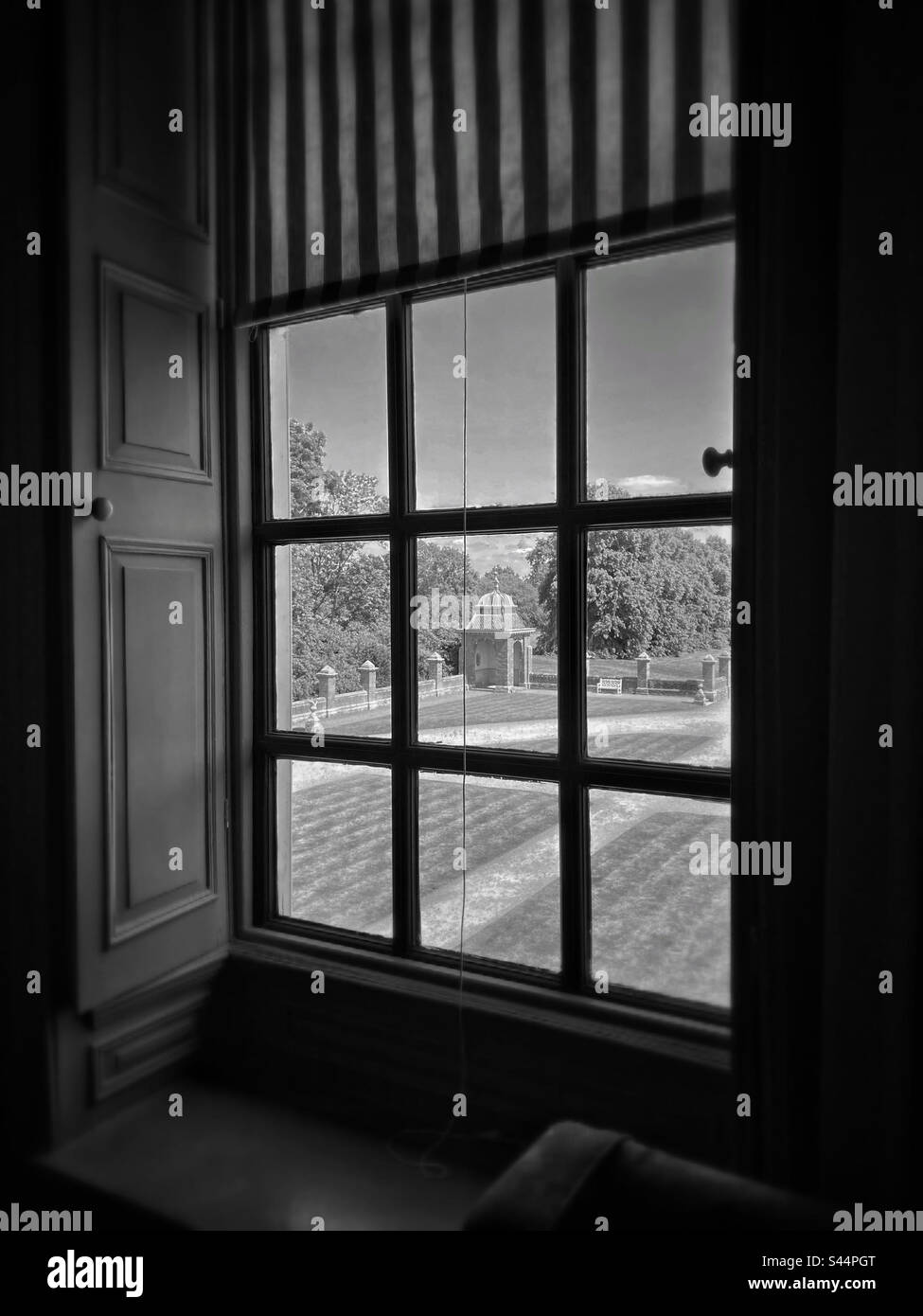 A Room With A View! Looking through a lattice window into an open area courtyard and walled garden. An English Manor House window view. Photo ©️ COLIN HOSKINS. - Smartphone Captured Stock Image A Room With A View! Looking through a lattice window into an open area courtyard and walled garden. An English Manor House window view. Photo ©️ COLIN HOSKINS. - Smartphone Captured Stock Image