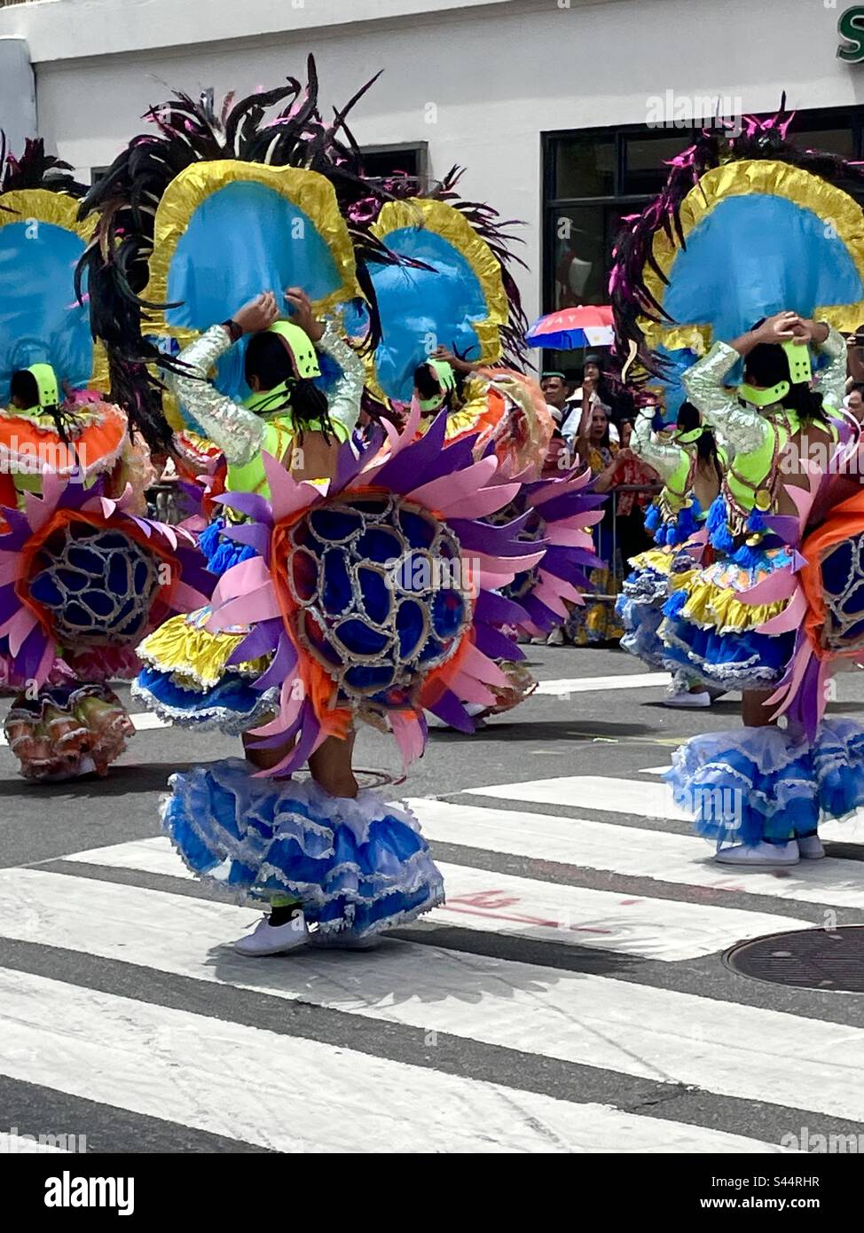 Colorful costumes in Filipino parade, New York City Stock Photo