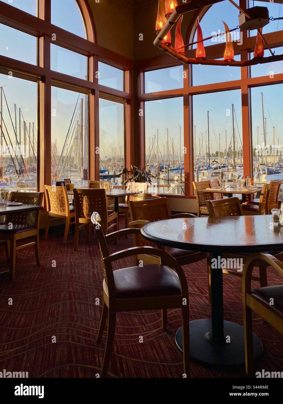 View of the marina from inside Anthony’s Grill Restaurant Everett Seattle Washington State USA - Smartphone Captured Stock Image
