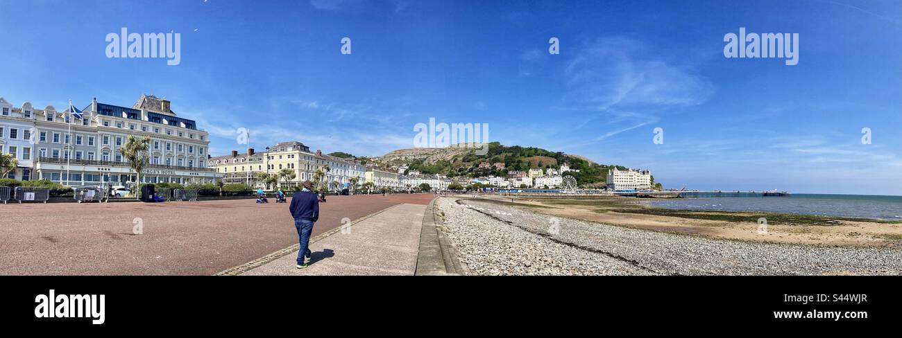 Man walking down the Promenade in Llandudno North Wales - Smartphone Captured Stock Image