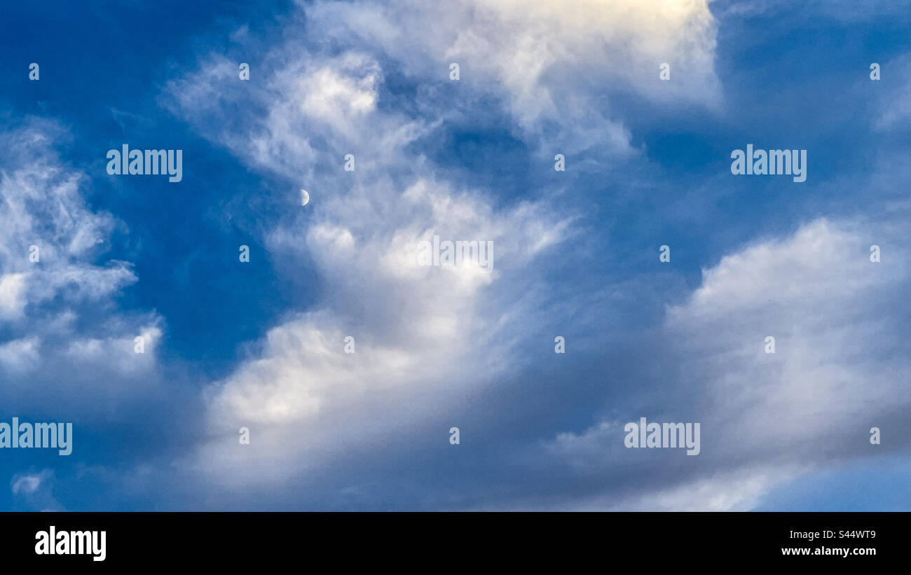 Blue sky with cloud formation moon hi-res stock photography and images ...