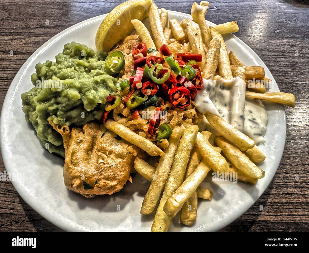 Friday Fish, Chips and Mushy Peas….and chillies - Smartphone Captured Stock Image