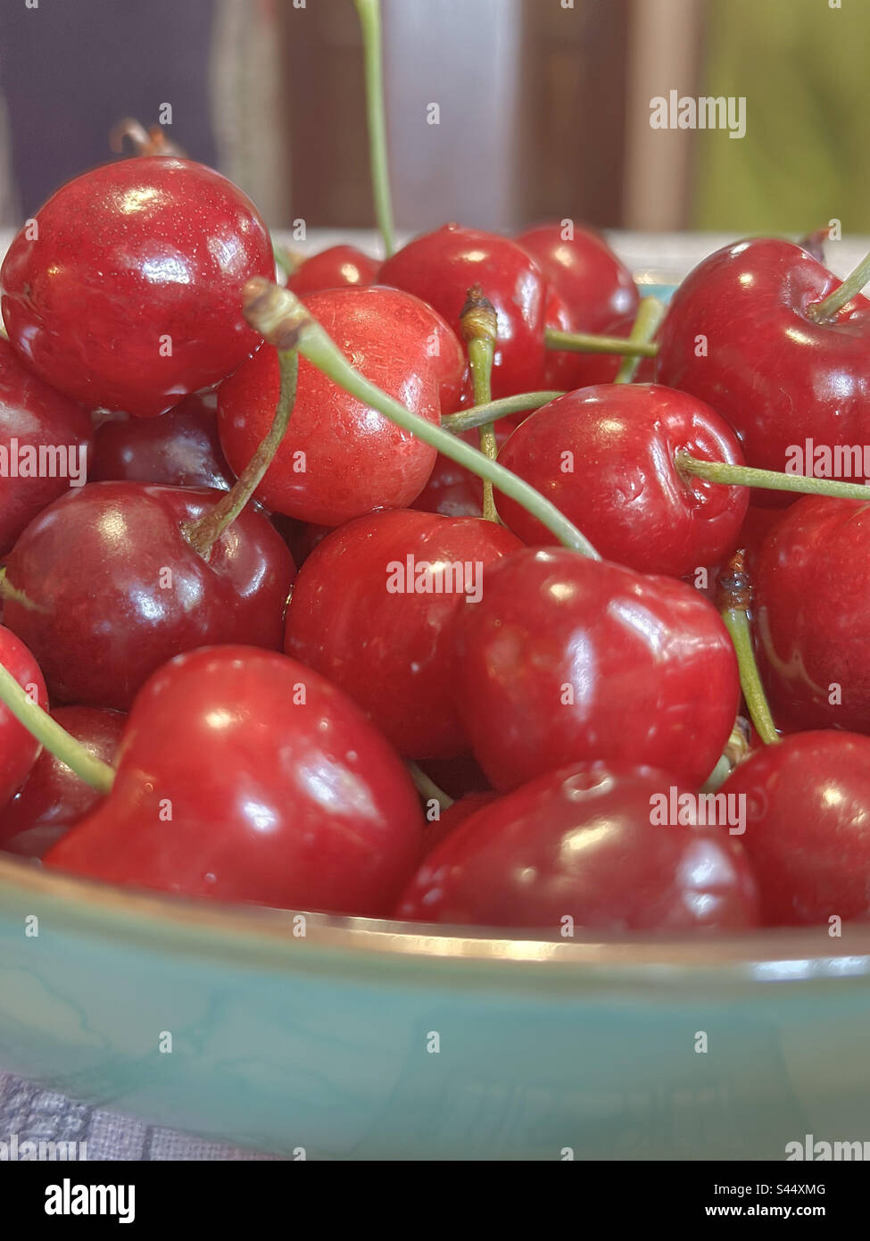 A bowl with a fresh healthy cherries Stock Photo