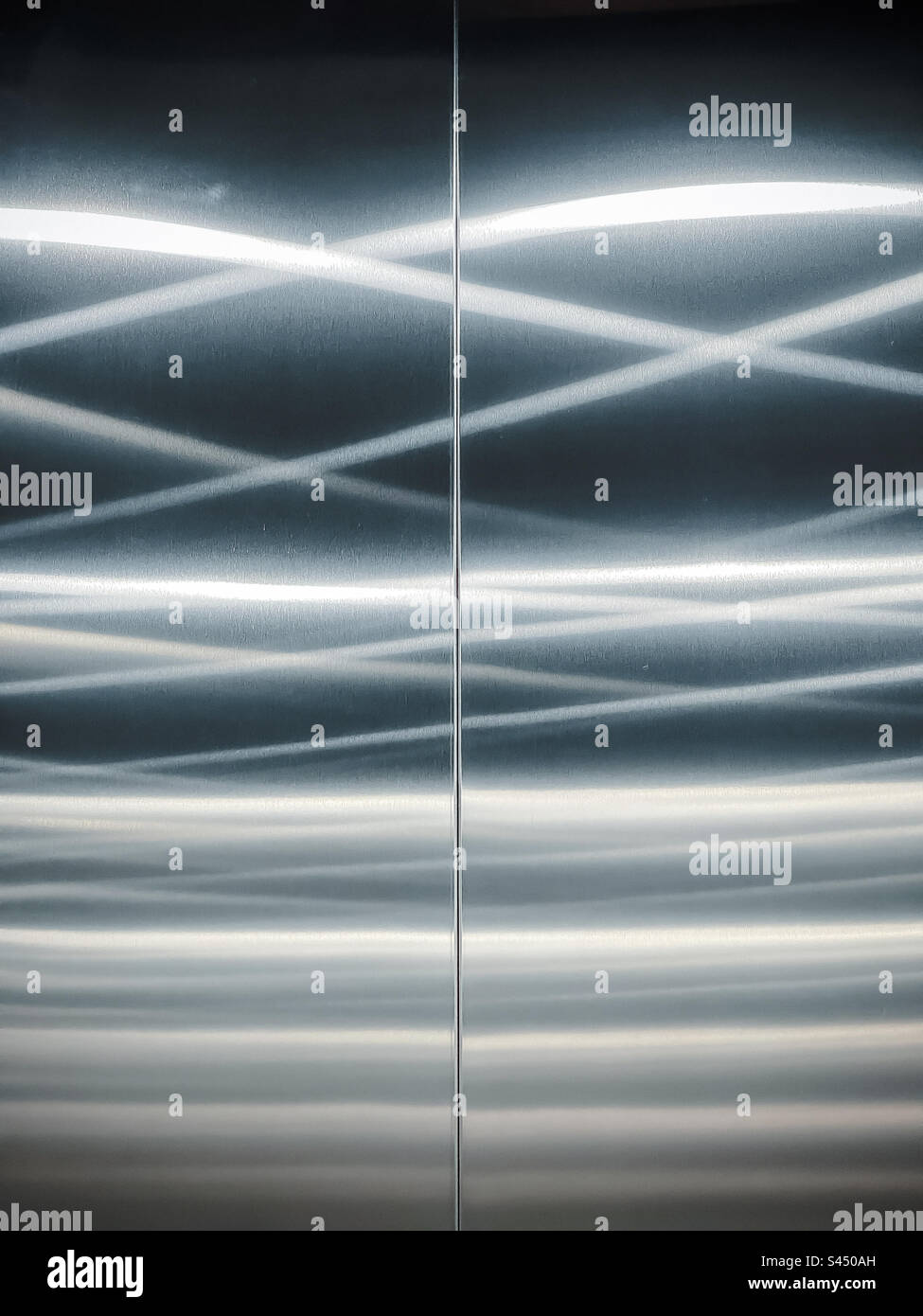 Full frame abstract background shot of led light reflections on metal surface. Pattern. Close-up. - Smartphone Captured Stock Image