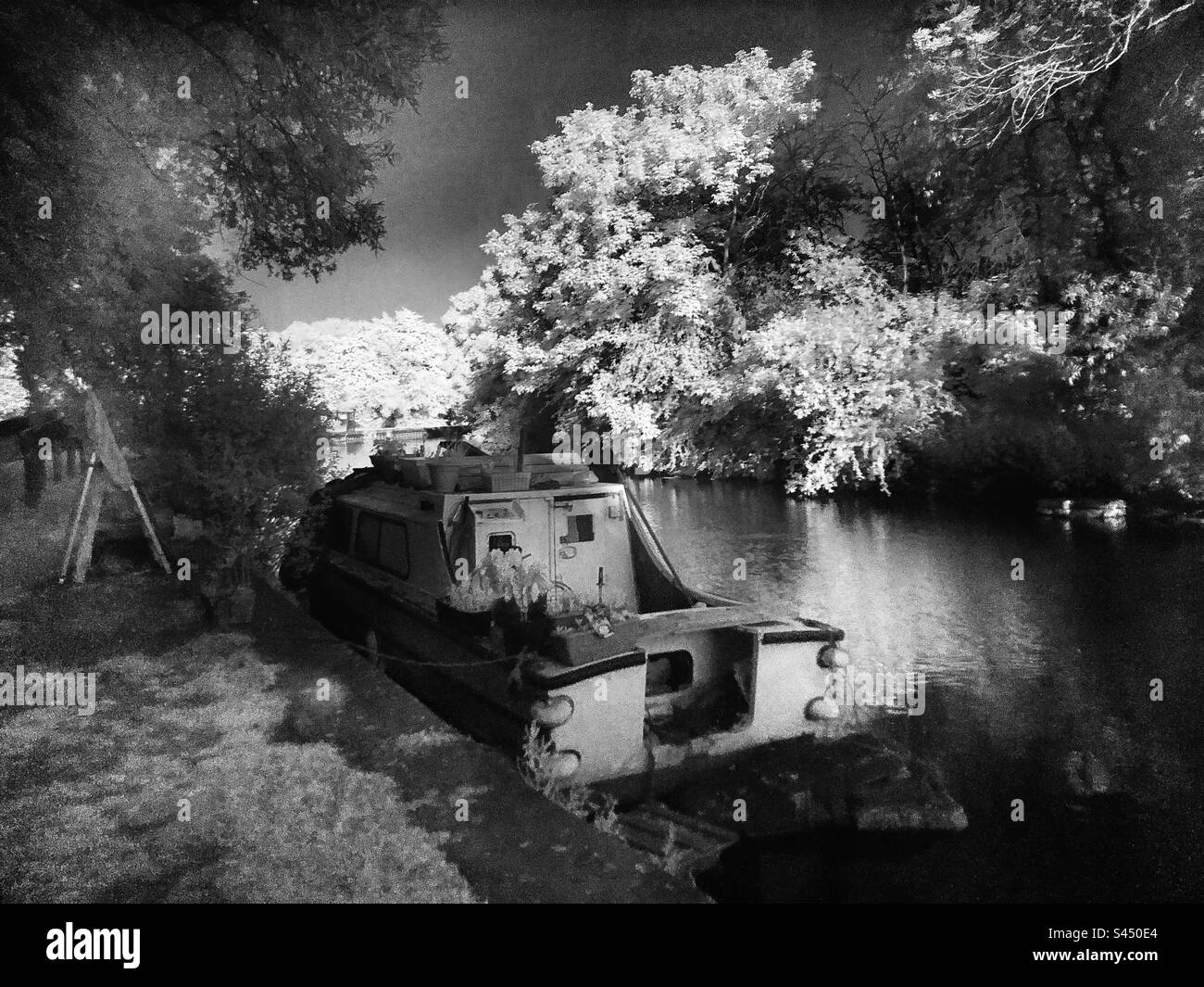 Infrared image of a boat by the canal - Smartphone Captured Stock Image