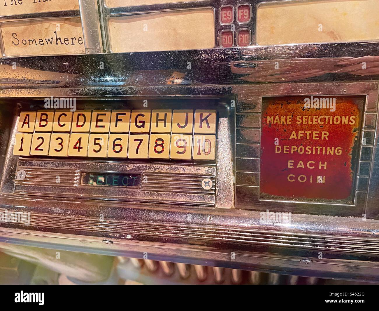 Close-up of a vintage jukebox push button selection panel, West side story stage setting display, 2023, Museum of Broadway, NYC, USA - Smartphone Captured Stock Image