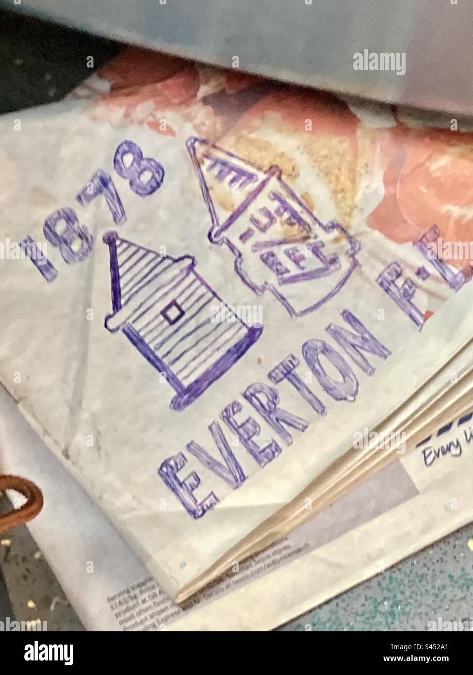 Everton graffiti on a newspaper - Smartphone Captured Stock Image