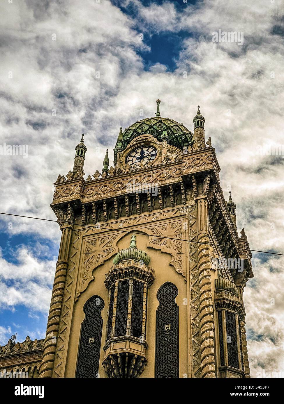 Clock tower of The Forum, Melbourne, Australia against cloudy sky. Moorish revival exterior. Stock Photo