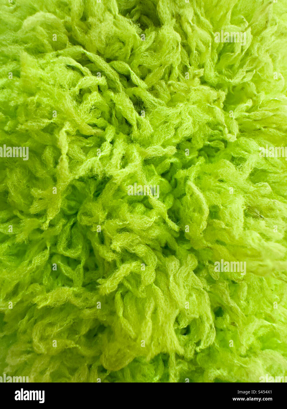 Green fuzzy texture shot of a duster Stock Photo Alamy