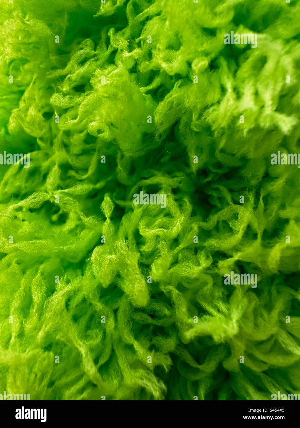 Green fuzzy texture shot of a duster Stock Photo Alamy