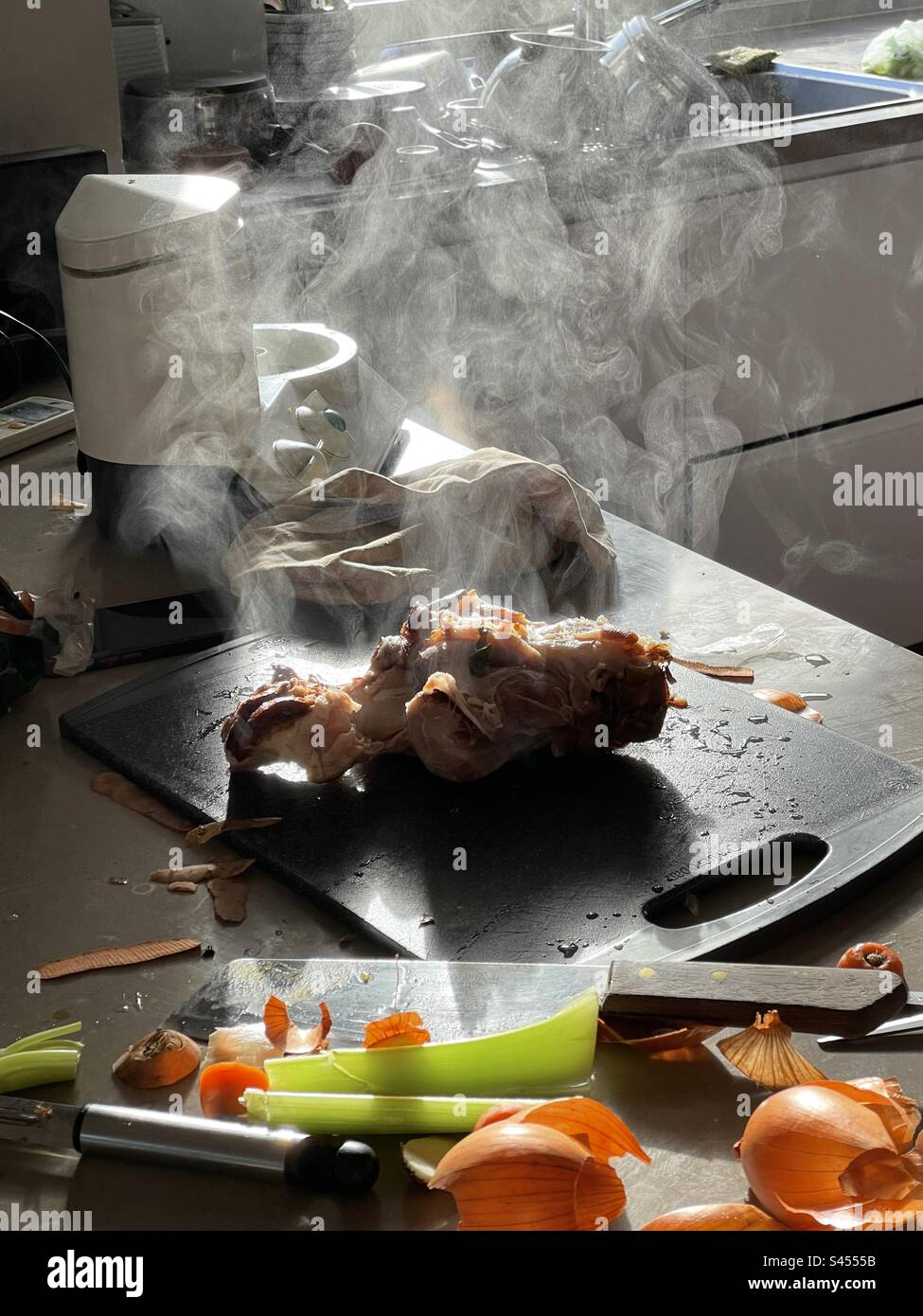 Steaming ham hock in the kitchen Stock Photo