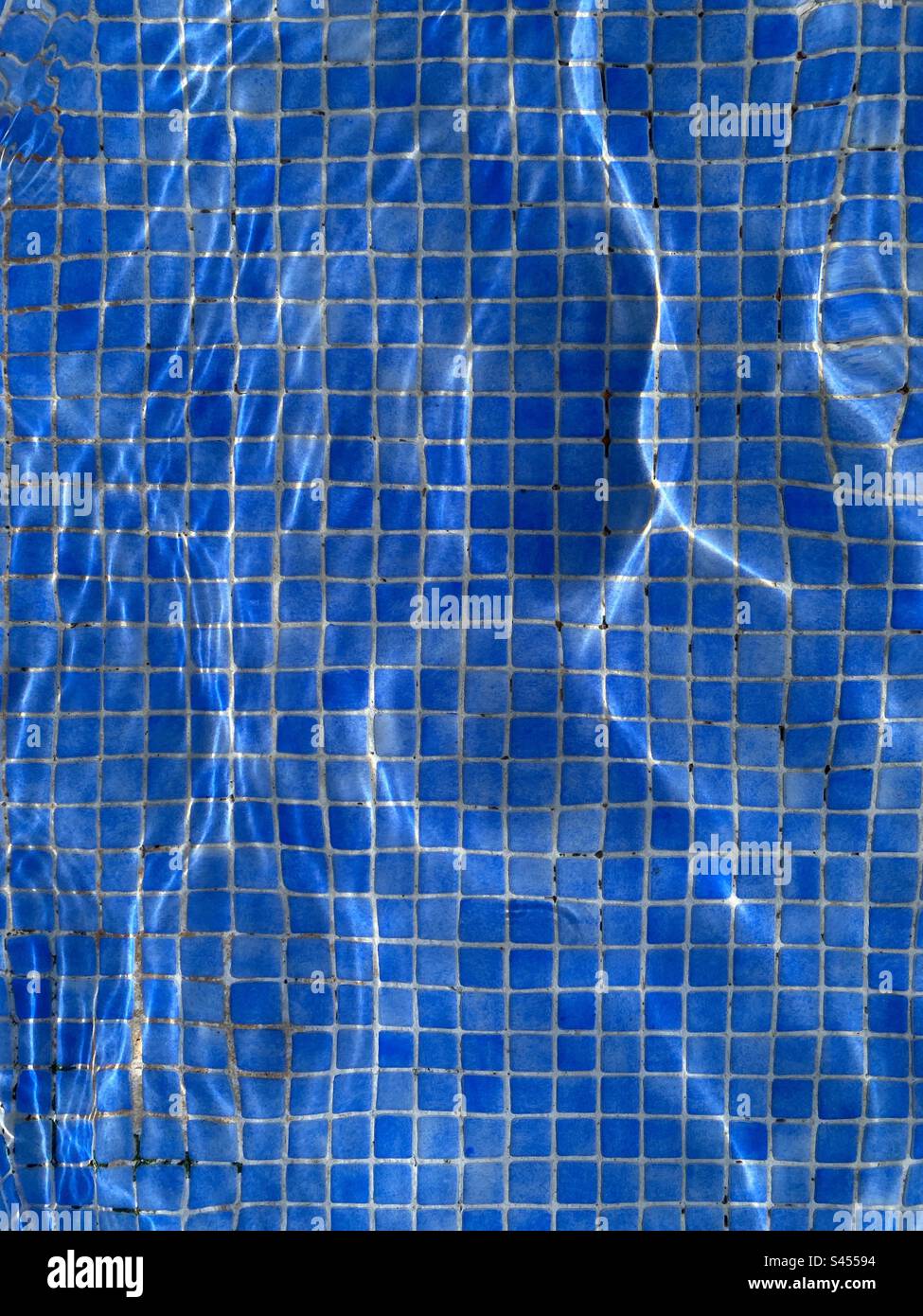 Blue mosaic tiled background under water - Smartphone Captured Stock Image