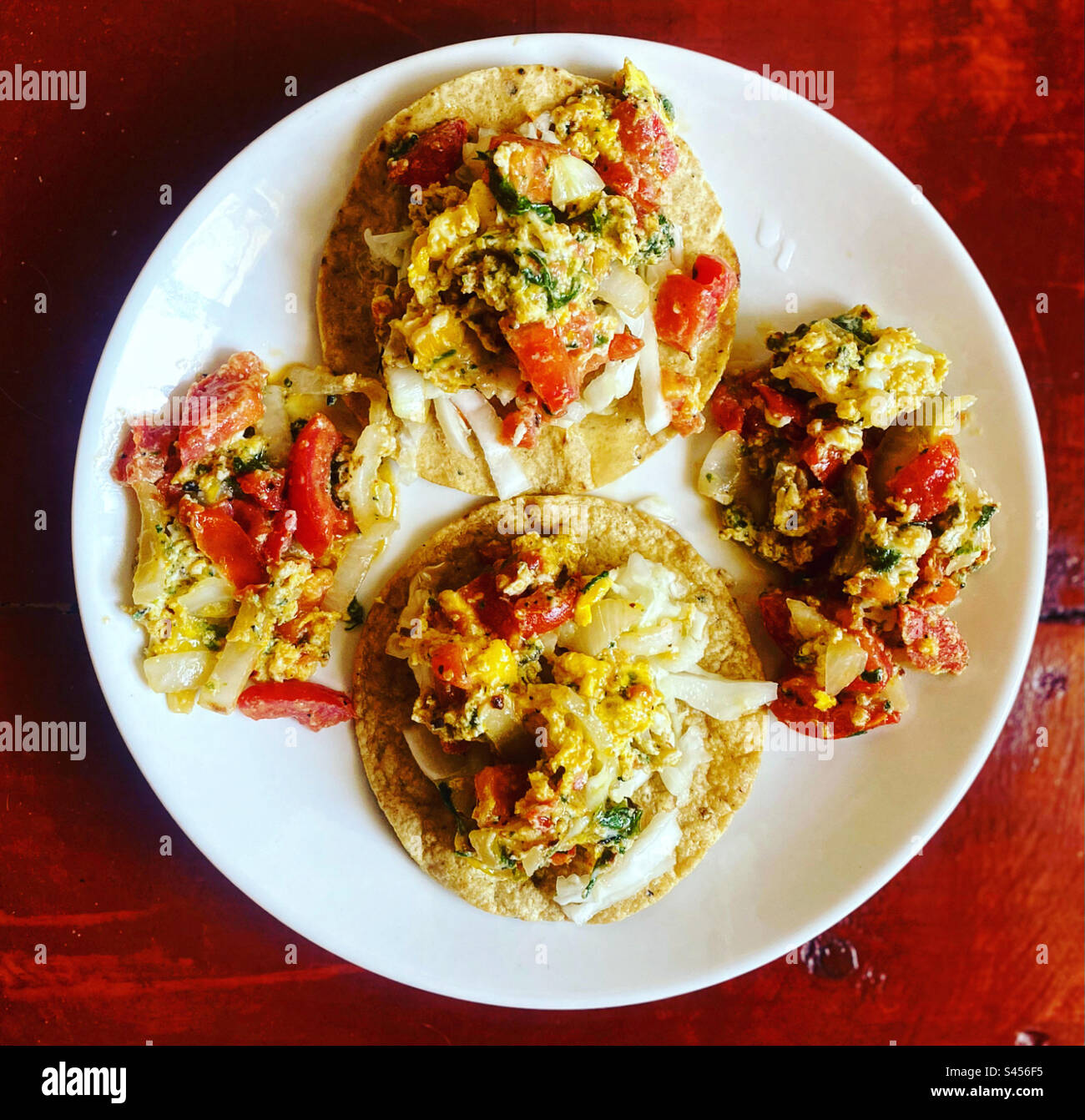 Eggs with vegetables in corn tortillas in Queretaro, Mexico Stock Photo