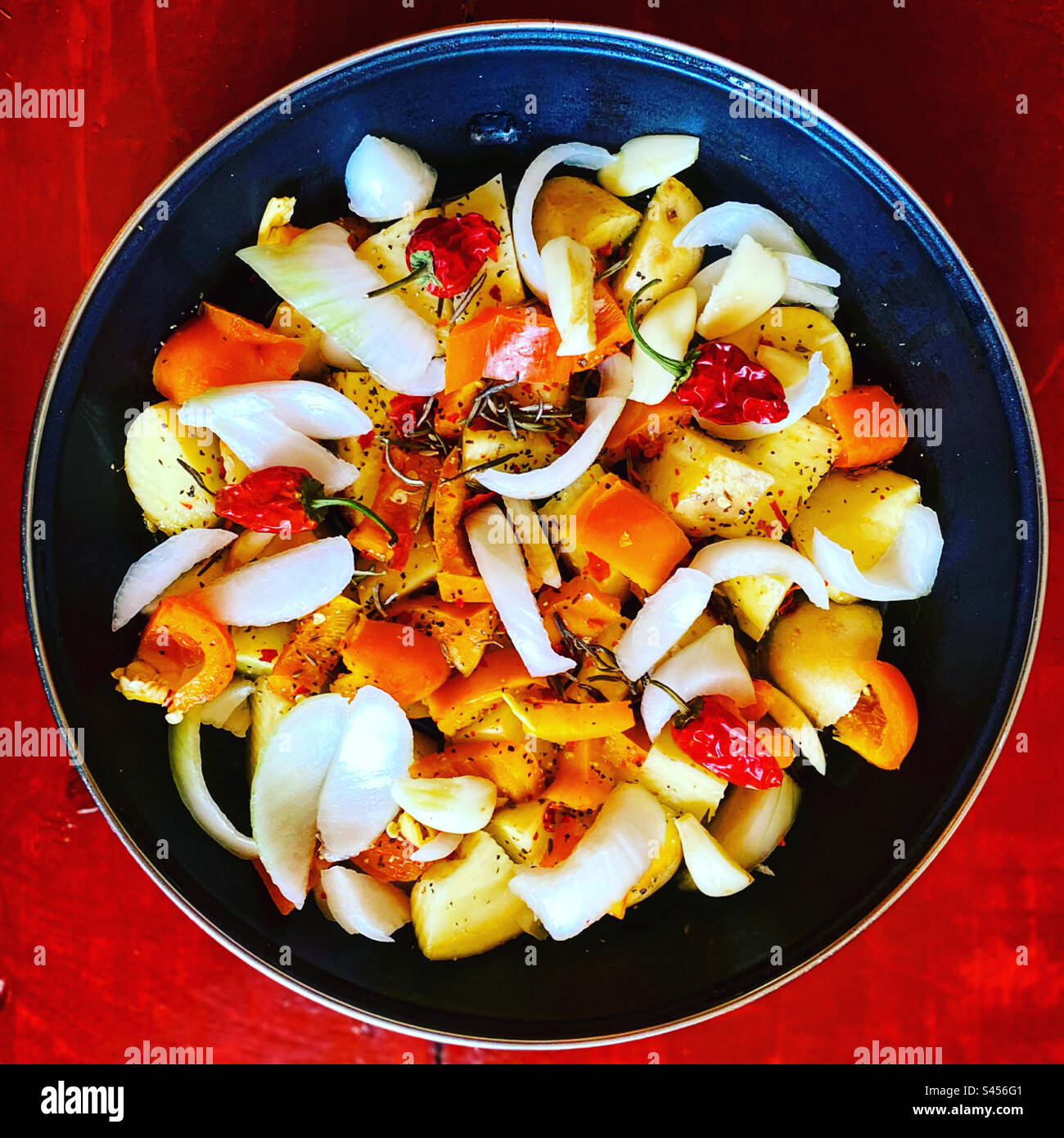 Potatoes, onion, orange peppers and red hot chilli peppers in Queretaro, Mexico - Smartphone Captured Stock Image