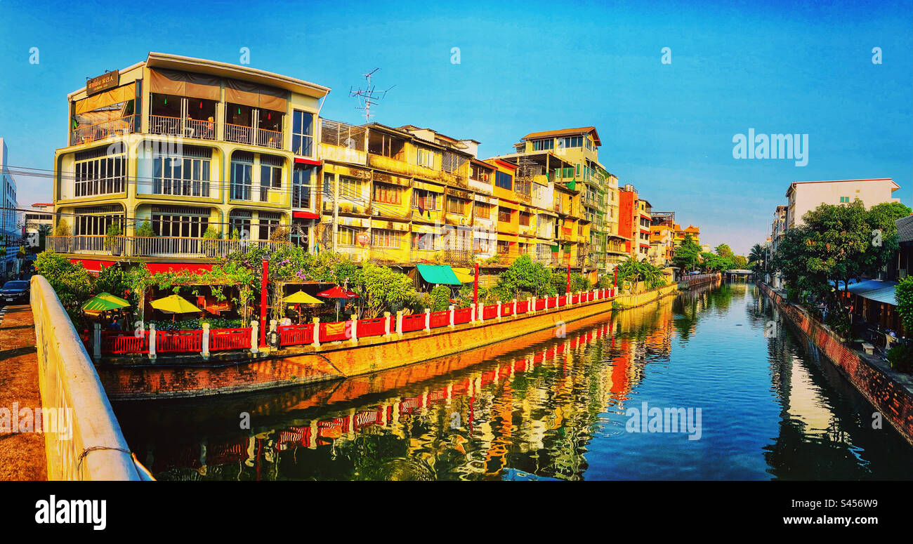 Canal side cafe in Bangkok Thailand in Bang Lamphu district - Smartphone Captured Stock Image