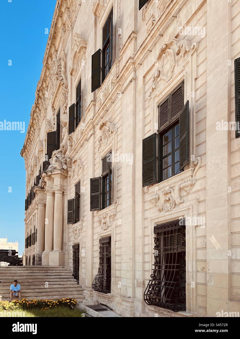Side view of the Auberge de Castille - baroque palace and the office of the prime minister of Malta located at the highest point of Valletta - Smartphone Captured Stock Image