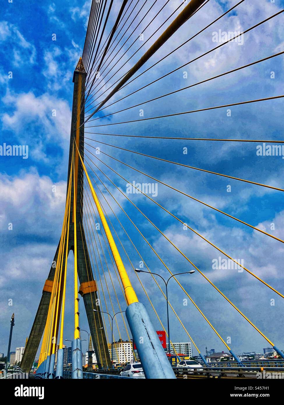 Rama VIII 8 bridge in Bangkok Thailand showing suspension bridge structure - Smartphone Captured Stock Image