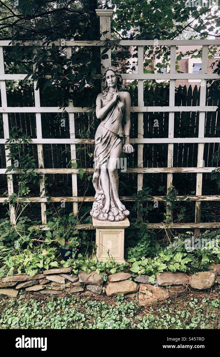 Statue in garden Stock Photo Alamy