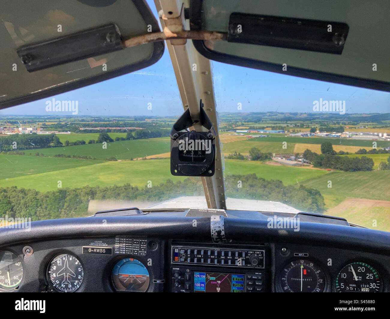 View from a Piper PA28 aircraft on the approach to Full Sutton airfield. - Smartphone Captured Stock Image