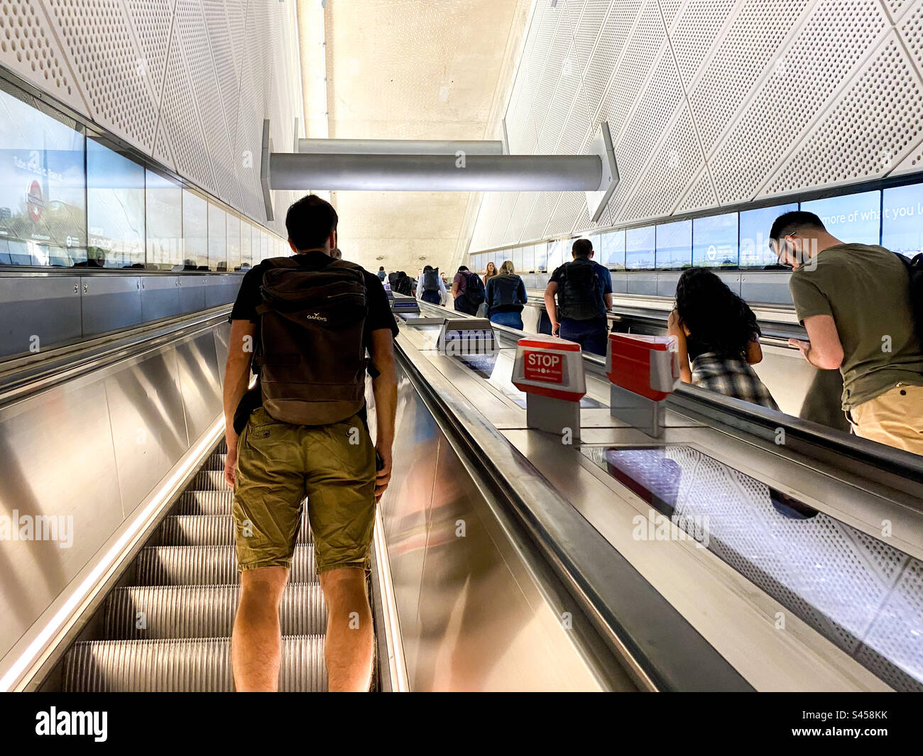 Ascending up an escalator from The London Underground, Elizabeth Line at Tottenham Court Road Station. - Smartphone Captured Stock Image