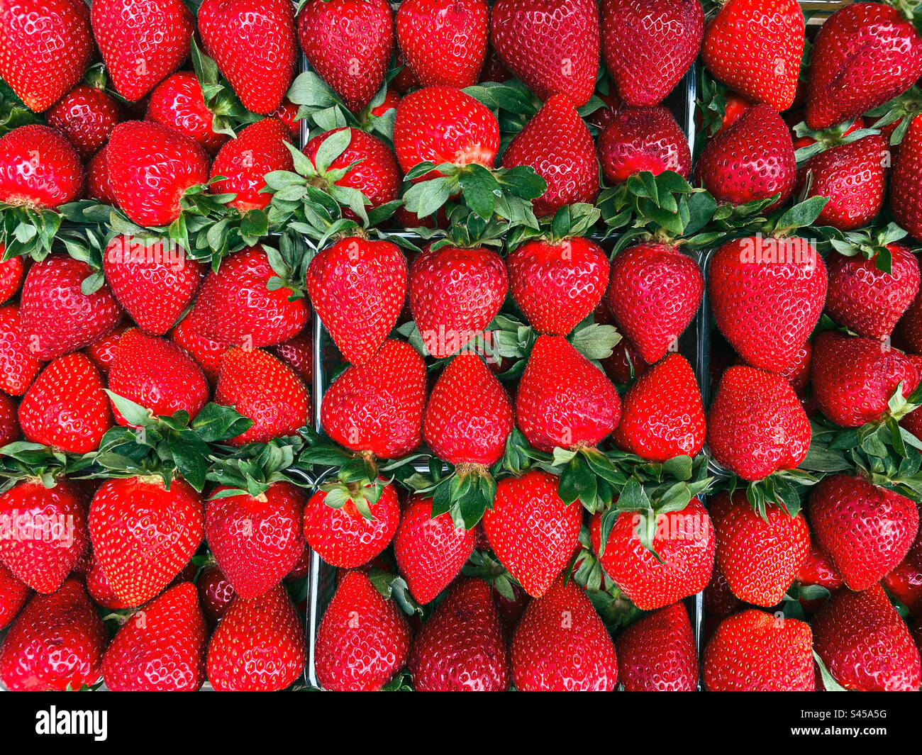 Ripe red strawberries in baskets Stock Photo