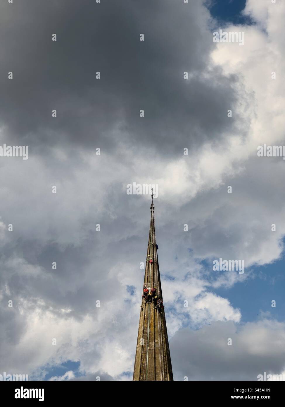 Steeplejacks at work. Lydney, St Mary The Virgin Church. - Smartphone Captured Stock Image