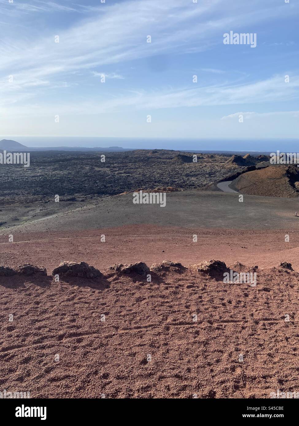 Red volcanic stones hi-res stock photography and images - Alamy