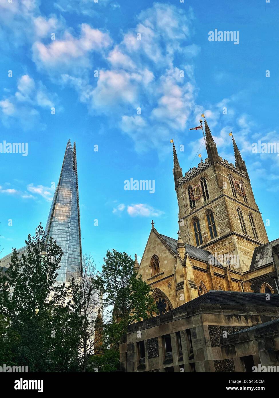 Old Southwark Cathedral dates from C7th & restorations C19th gothic juxtaposition new Shard at London Bridge - Smartphone Captured Stock Image