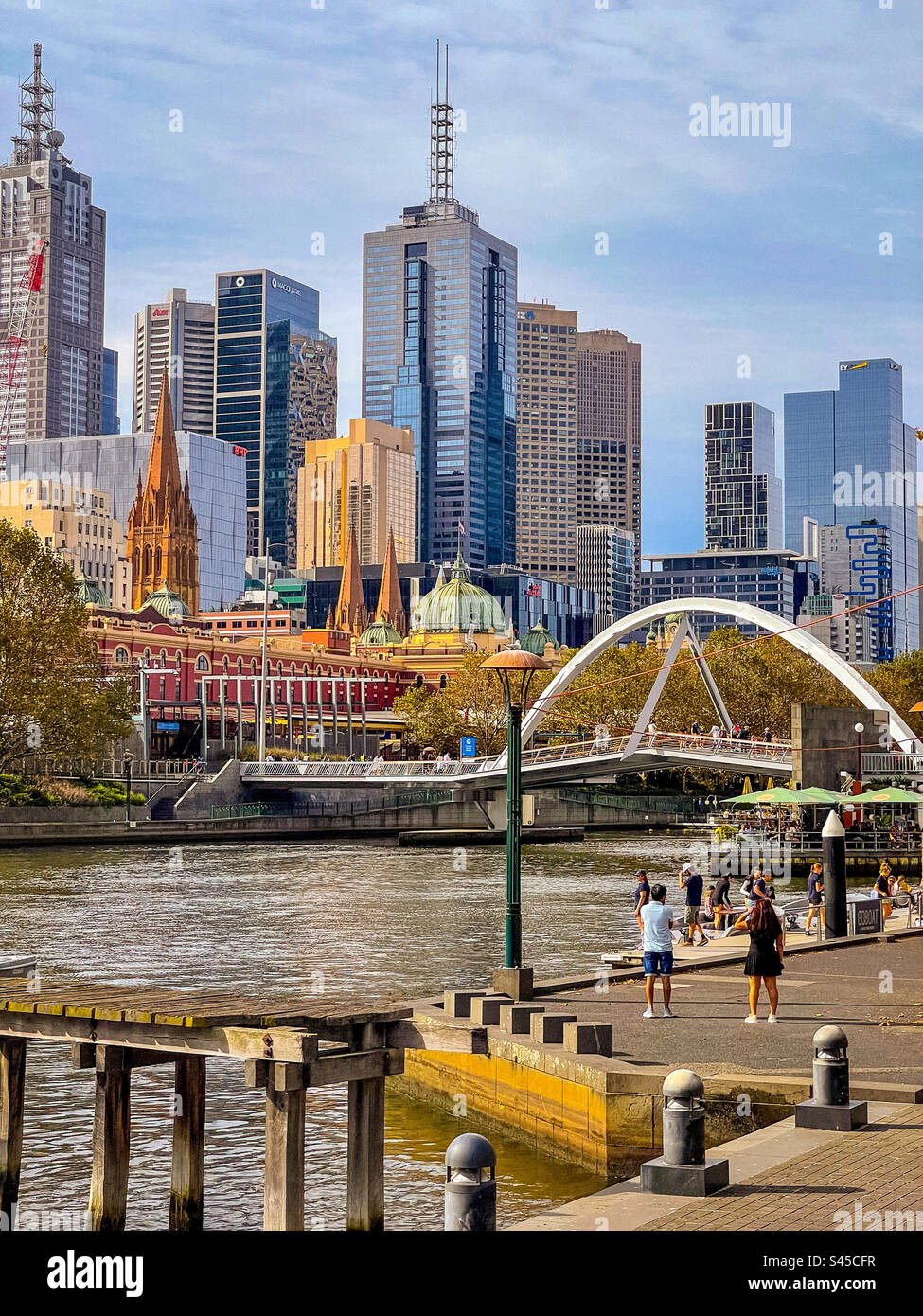 View of Yarra River, Evan Walker bridge, Melbourne CBD and city skyline from Southbank Promenade in Melbourne, Victoria, Australia. Stock Photo