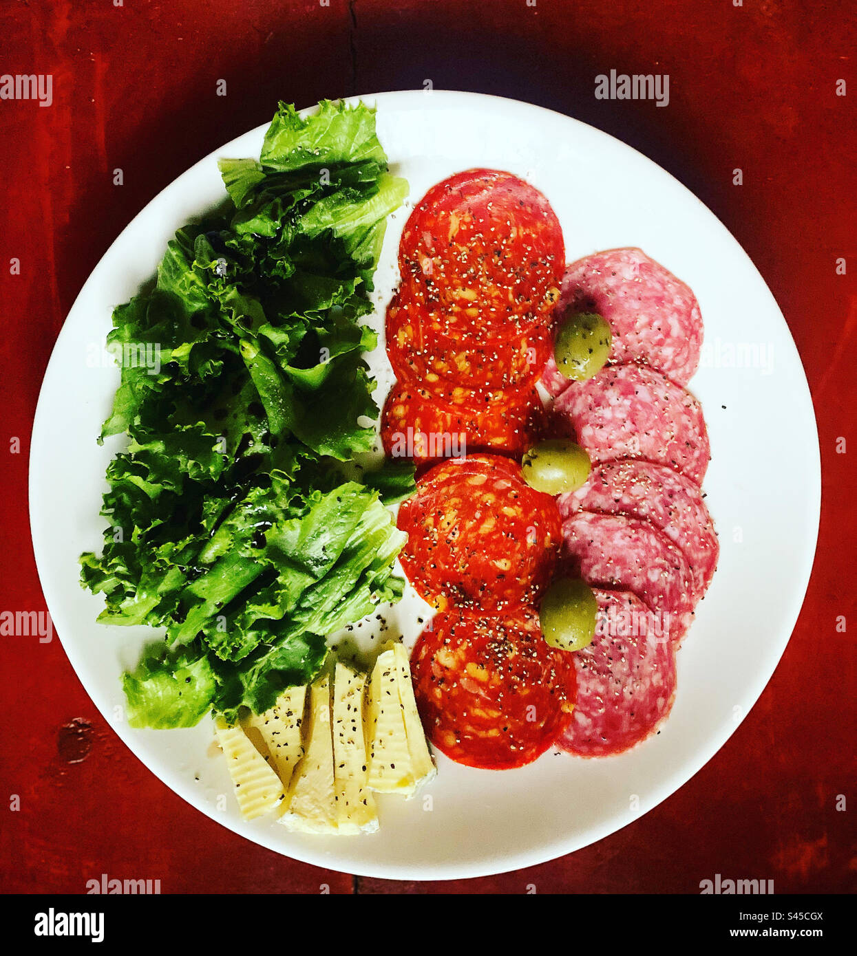 Lettuce salad, chorizo, olives and salami in Queretaro, Mexico Stock