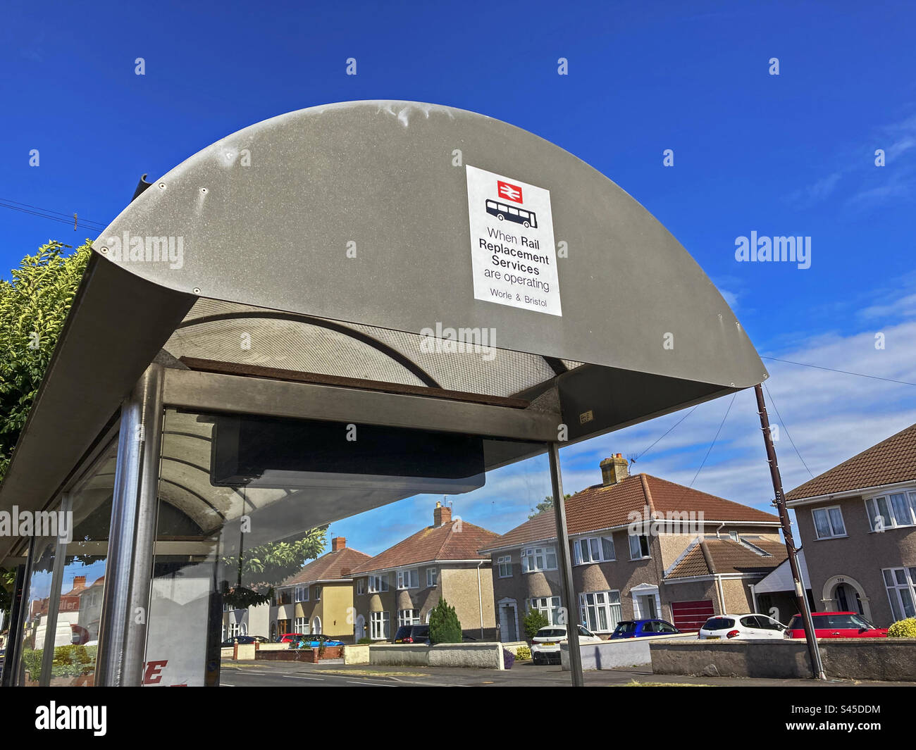A bus stop near Weston Milton railway station in Weston-super-Mare, UK which is a designated departure point for rail replacement bus services - Smartphone Captured Stock Image